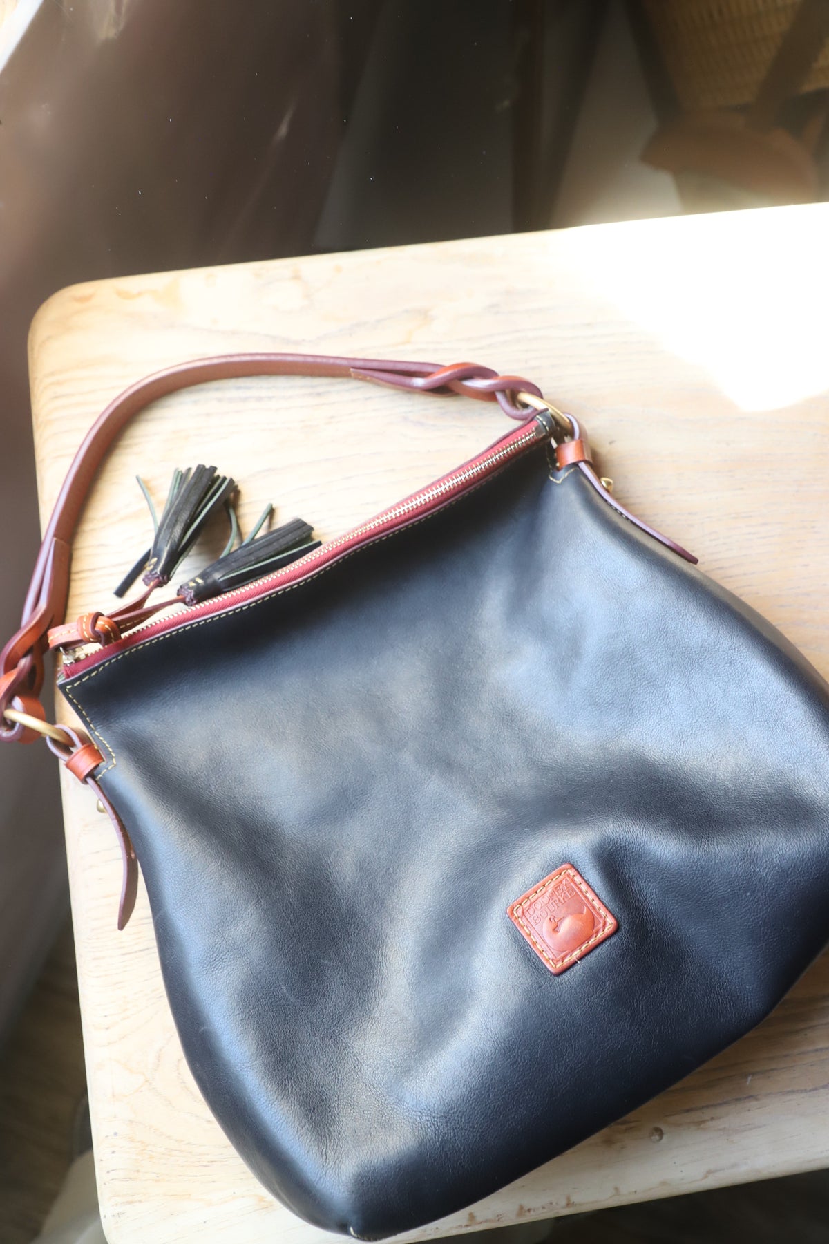 Dooney and Bourke Florentine Twist Strap hobo bag