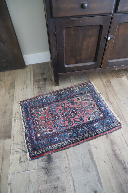 Small vintage woven rug