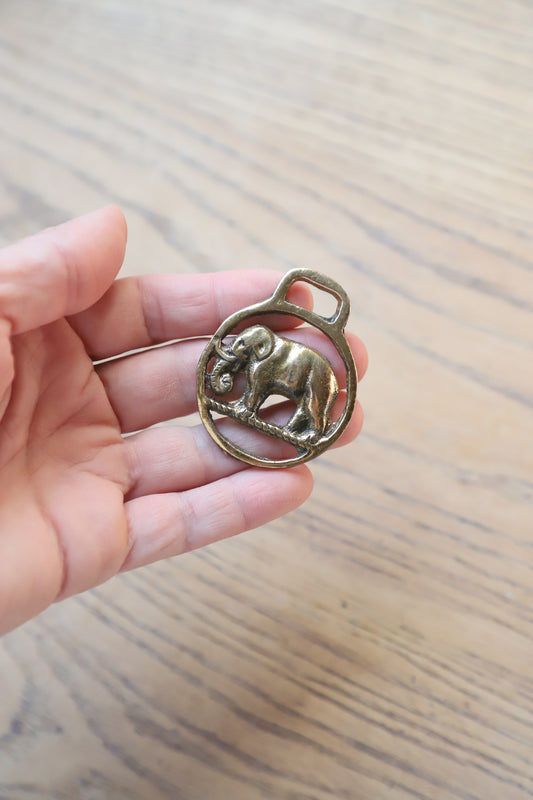 Vintage brass elephant medallion